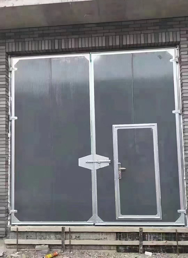 哈巴河工业平开门在大型设备制造车间的应用实例